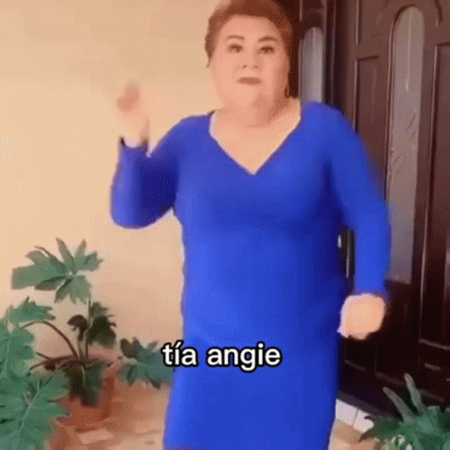 Woman in Blue Dress Dancing