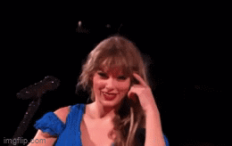 Woman in Blue Dress Giving Middle Finger