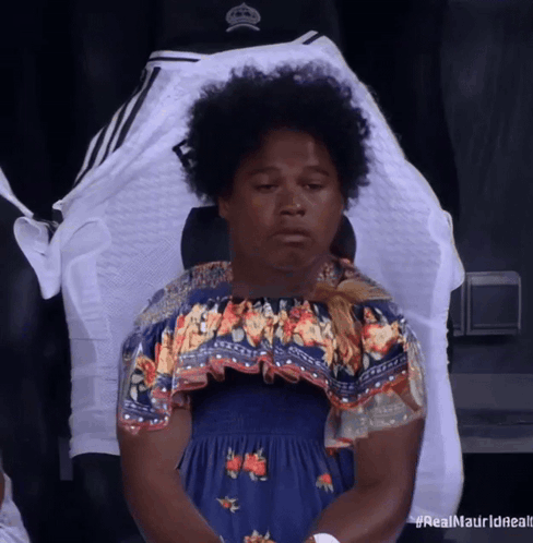 Woman In Blue Dress In Front Of Real Madrid Jersey GIF