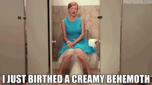 Woman in Blue Dress on Toilet I Just Birthed a Creamy Behemott
