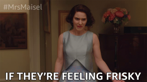 Woman in Blue Dress Saying Feeling Frisky