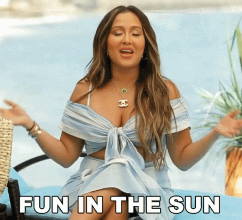 Woman In Blue Dress Saying Fun In The Sun By Pool GIF