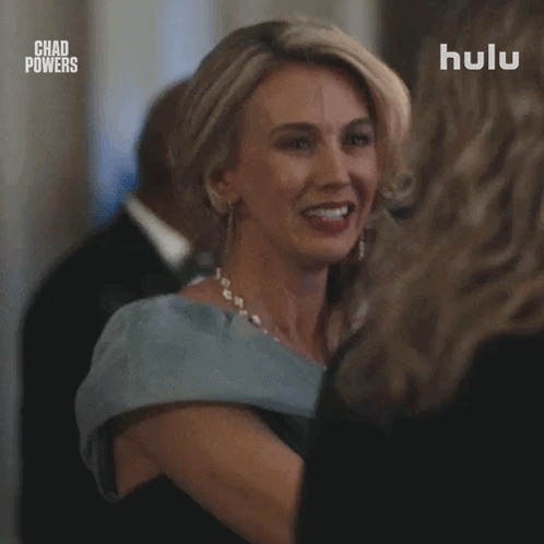 Woman in Blue Dress Talking in Hulu Advertisement