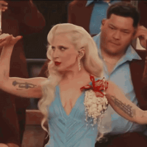 Woman in Blue Dress Tattooed Trumpet