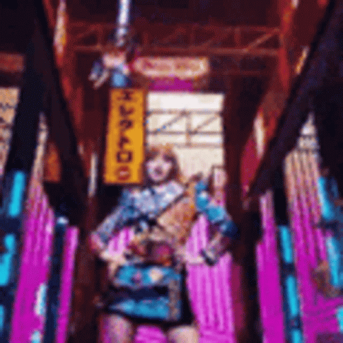 Woman In Blue Dress With Tokyo Sign In Tunnel GIF