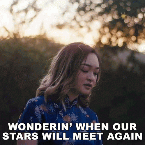 Woman in Blue Dress Wonderin When Our Stars Will Meet Again