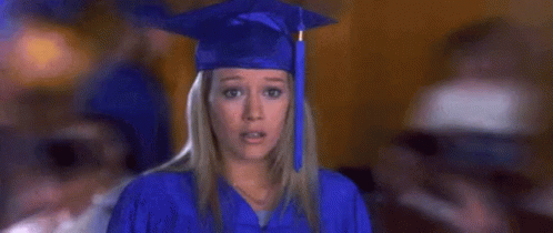 Woman in Blue Graduation Cap and Gown
