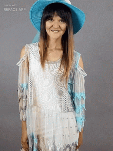 Woman In Blue Hat And White Dress GIF