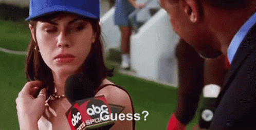 Woman In Blue Hat Talking Into ABC Sports Microphone GIF