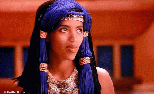 Woman in Blue Headband and Necklace Thriller Glitter