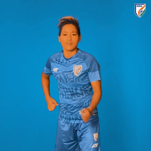 Woman in Blue India Jersey Dancing