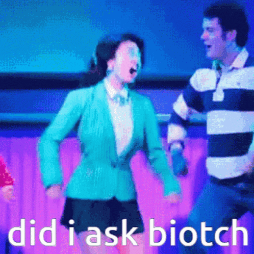 Woman In Blue Jacket Dancing With Man GIF