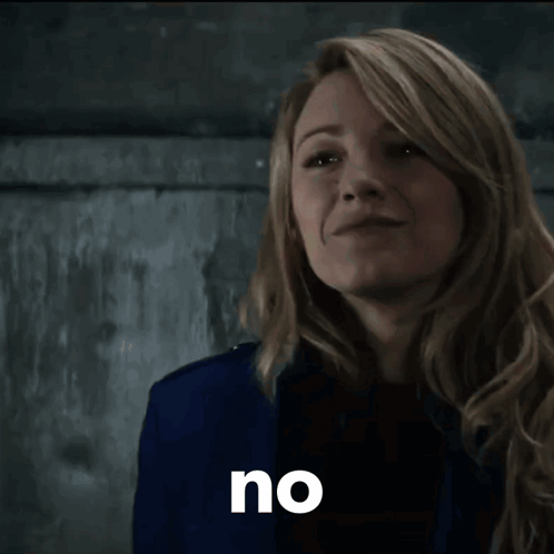 Woman in Blue Jacket Saying No