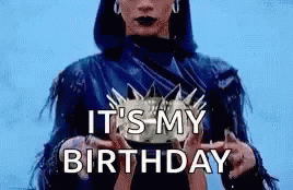 Woman in Blue Leather Jacket Holding Crown Saying Its My Birthday
