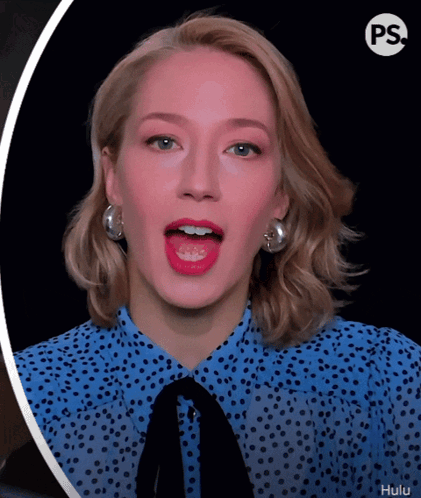 Woman in Blue Polka Dot Shirt Tongue Out