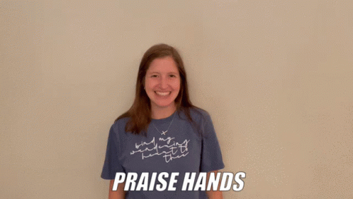 Woman in Blue Praise Hands Shirt
