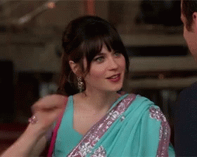 Woman in Blue Purple Sari Talking to Man