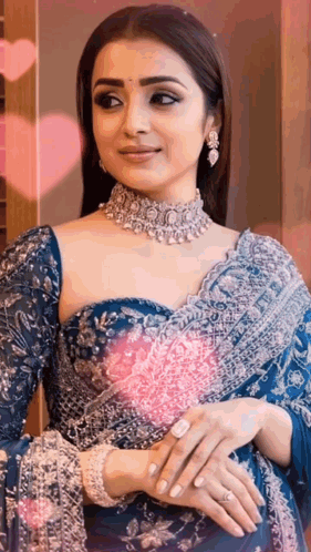 Woman in Blue Saree and Necklace