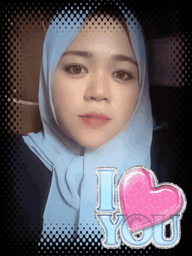 Woman in Blue Scarf with Pink Heart Saying I Love You