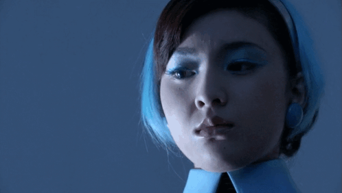 Woman in Blue Scarf