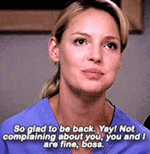 Woman in Blue Scrub Saying So Glad to Be Back Yay Not Complaining About You You and I Are Fine Boss