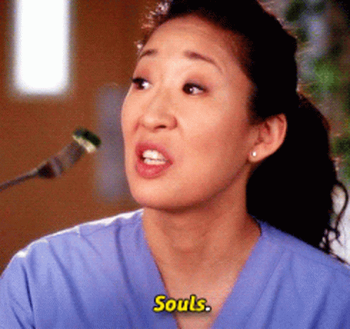 Woman in Blue Scrub Top Talking Into Microphone Says Souls