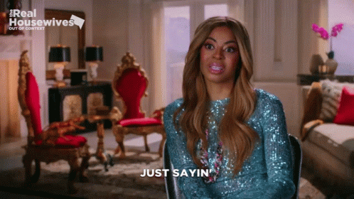 Woman in Blue Sequined Dress Saying Just Sayin