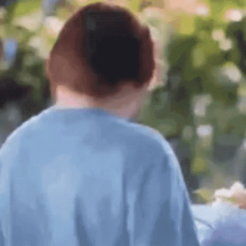Woman in Blue Shirt
