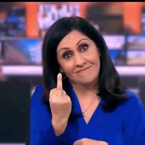 Woman in Blue Shirt Giving Middle Finger