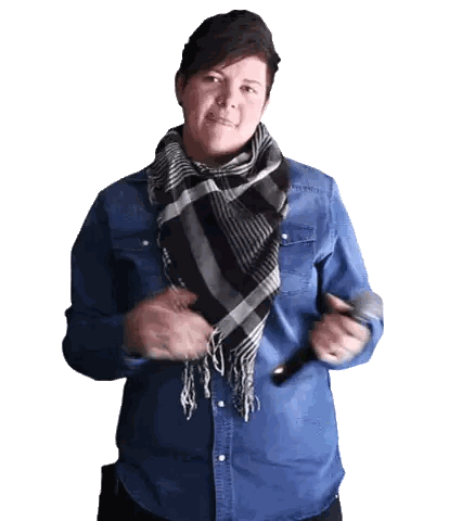 Woman in Blue Shirt Holding Microphone