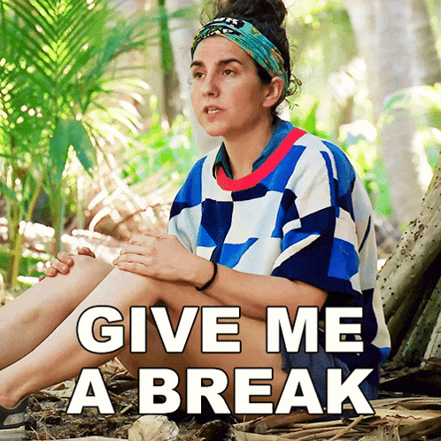 Woman In Blue Shirt Making Funny Face Another Woman Watches GIF