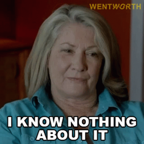 Woman in Blue Shirt Saying I Know Nothing