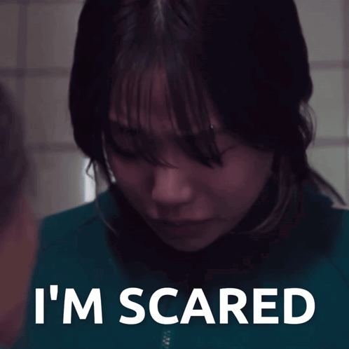 Woman in Blue Shirt Saying Im Scared