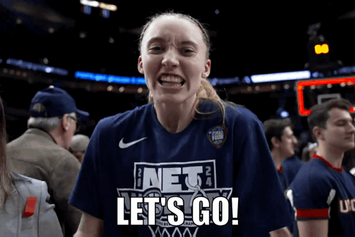 Woman in Blue Shirt Saying Let's Go On It
