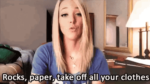 Woman in Blue Shirt Says Rocks Paper Take Off All Your Clothes