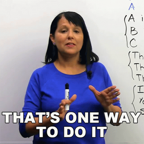 Woman in Blue Shirt Writing That's One Way