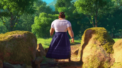Woman in Blue Skirt Walking Through Field