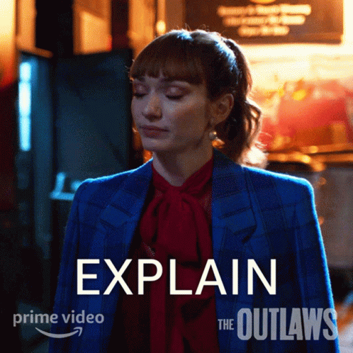 Woman in Blue Suit with Explain Sign