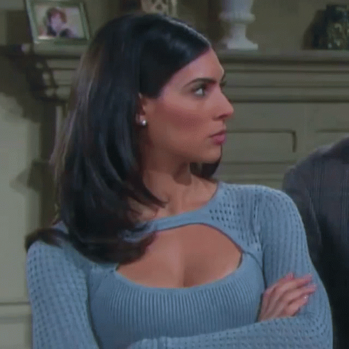 Woman in Blue Sweater Crossing Arms