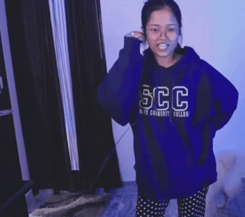 Woman In Blue Sweater Dancing GIF