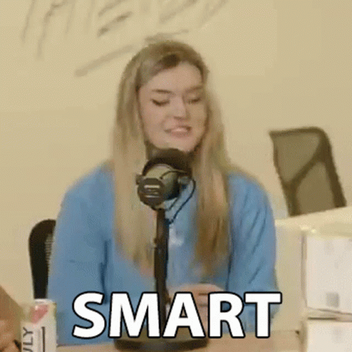 Woman in Blue Sweater Saying Smart