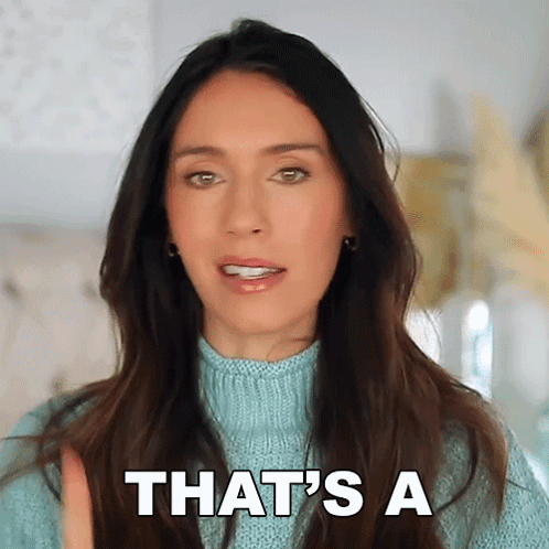 Woman in Blue Sweater Saying That's A