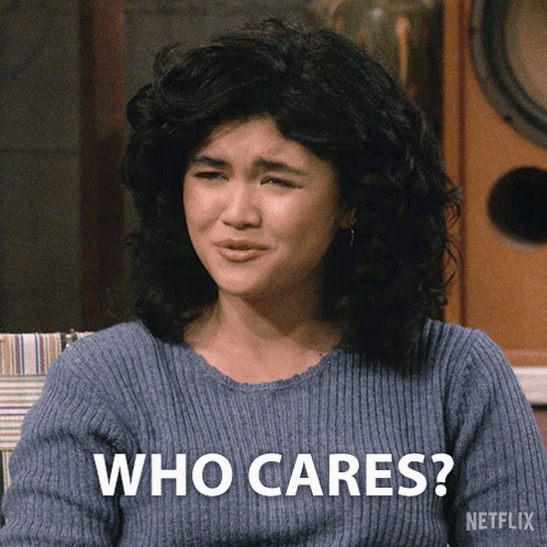 Woman in Blue Sweater Says Who Cares