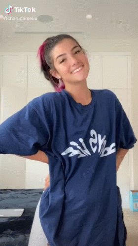 Woman in Blue T-Shirt Smiling