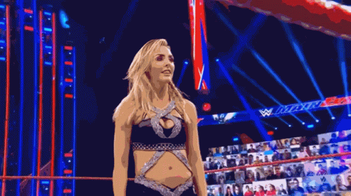 Woman in Blue Top in Wrestling Ring
