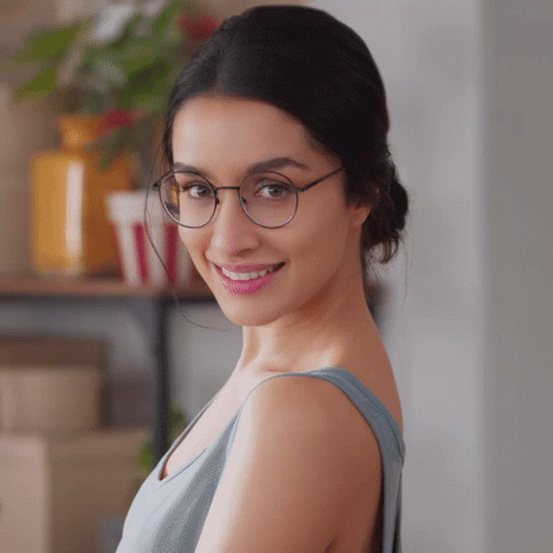 Woman In Blue Top Smiling GIF