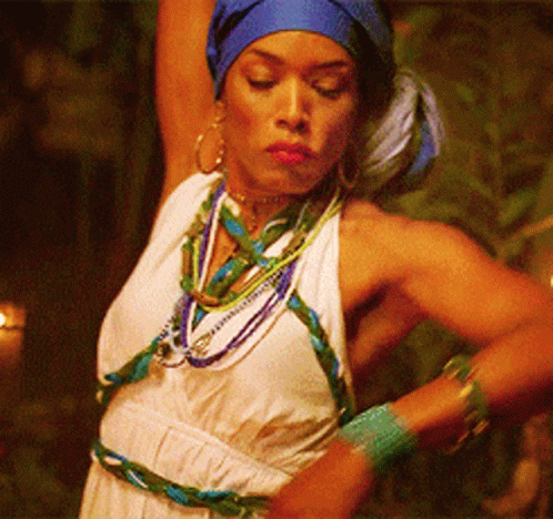 Woman in Blue Turban and White Dress