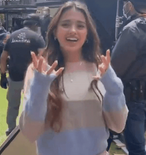Woman In Blue White Striped Sweater Smiling Group