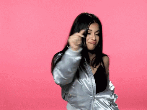Woman In Bomber Jacket Making Funny Face GIF
