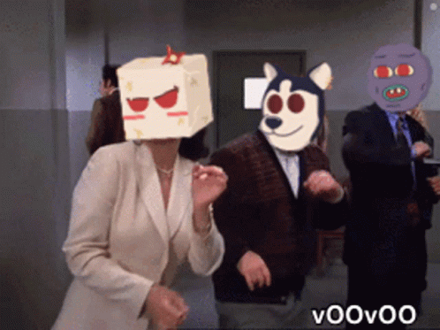 Woman In Box Dancing With Man In Dog Mask GIF